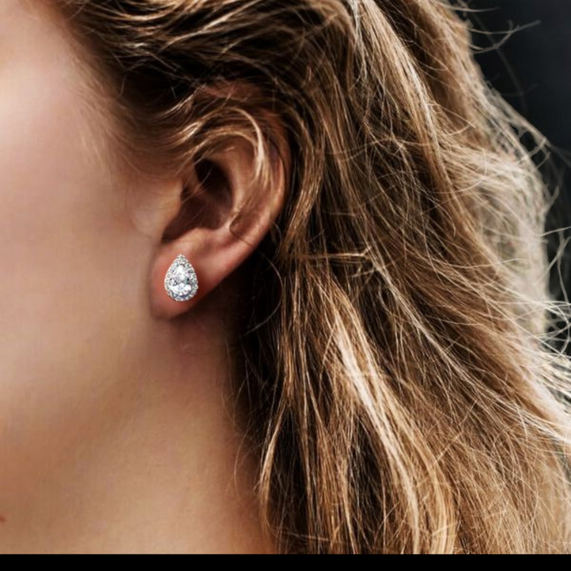 Enigmatic Pear Cut Moissanite Gold Plated Earrings