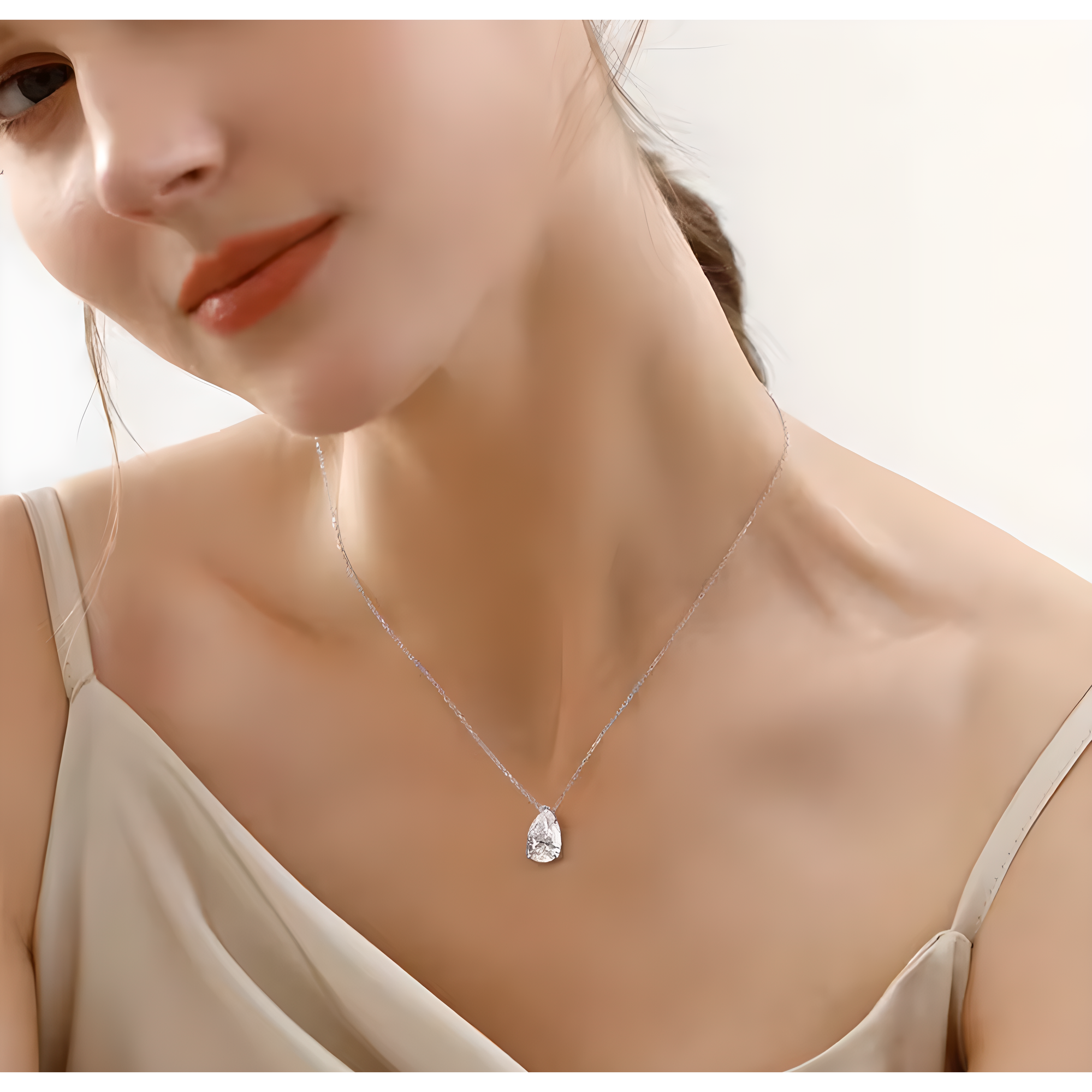 Orelia Pear Cut Moissanite Silver Pendant Necklace