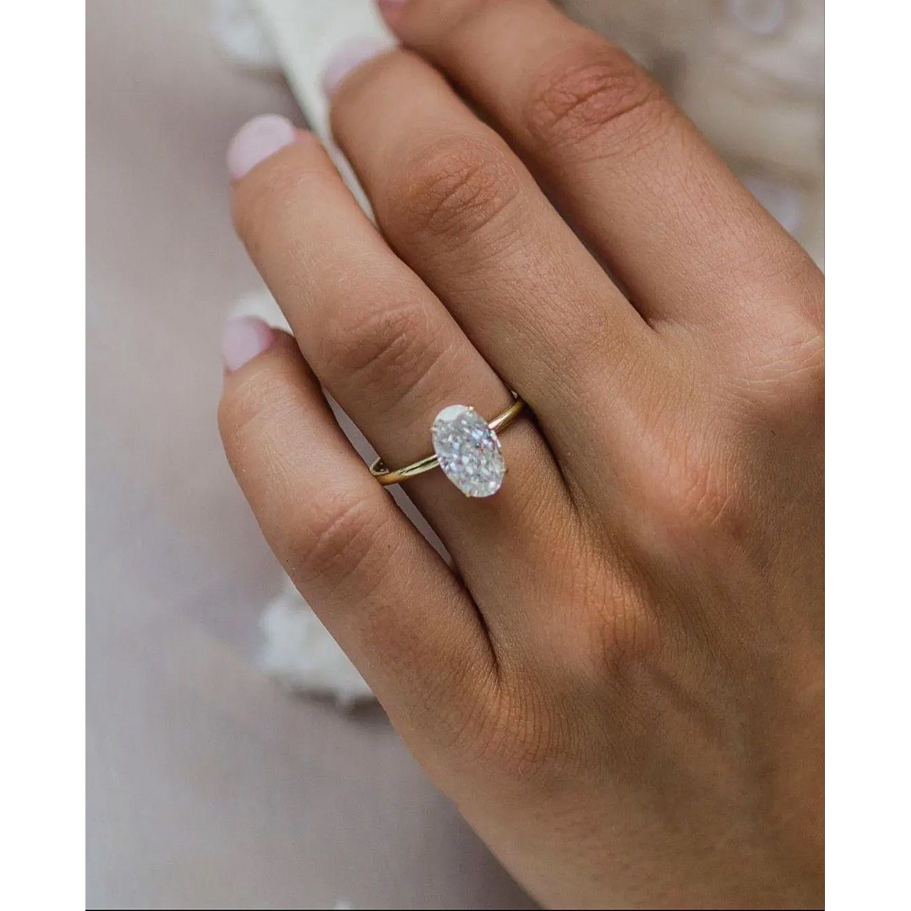 Oval Elegance: The 3 Carat Crushed Ice Moissanite Ring