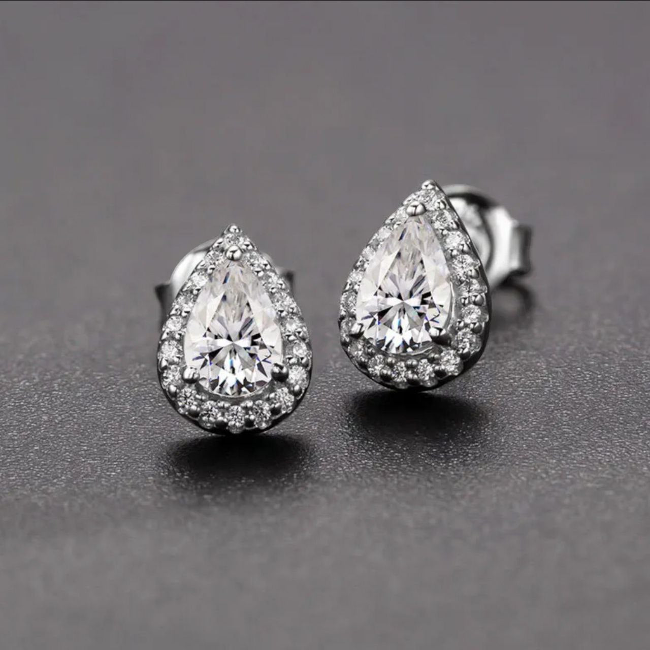 Enigmatic Pear Cut Moissanite Gold Plated Earrings