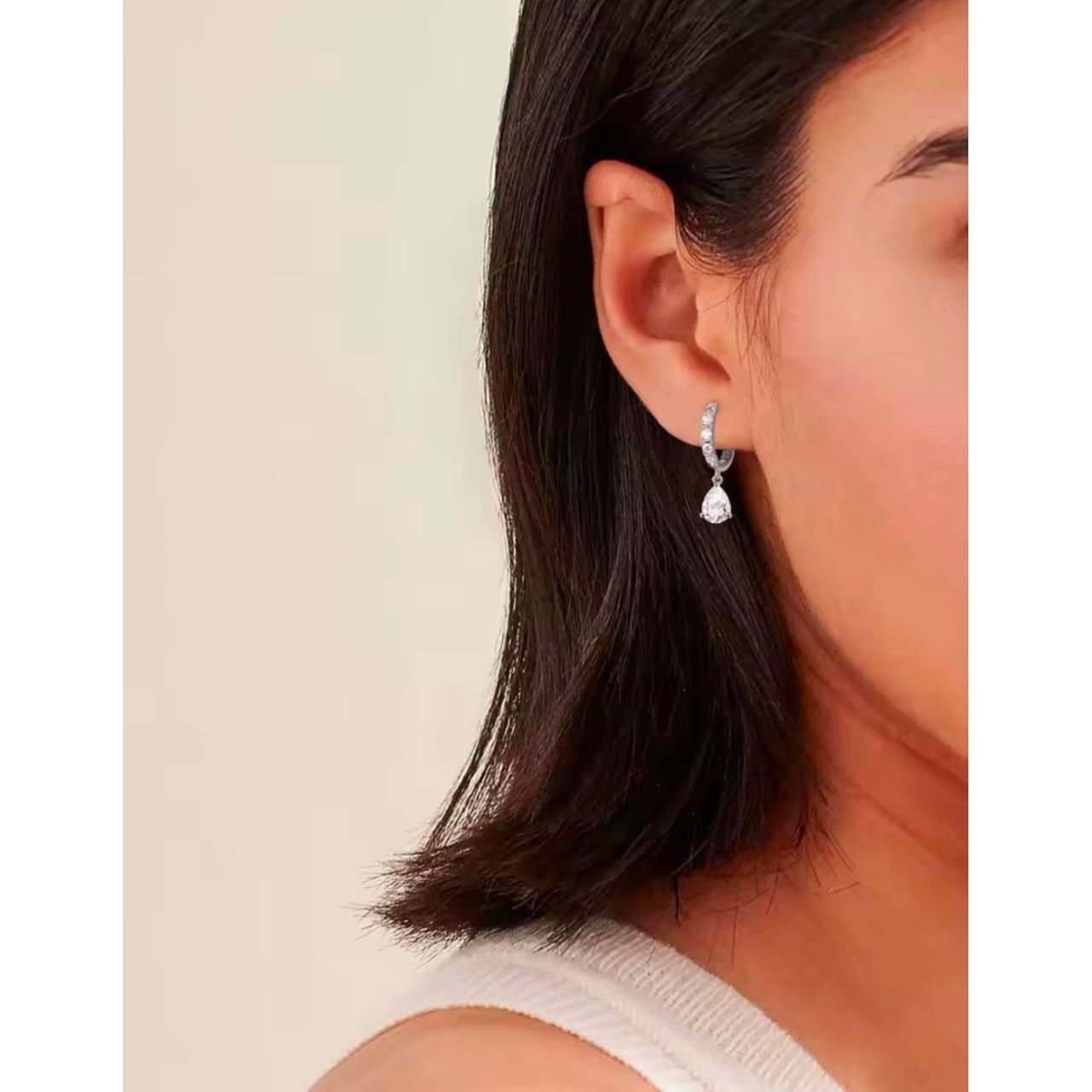 girl wearing moissanite earrings